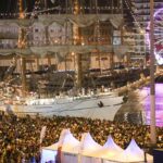 Barcos participantes en la Gran Regata de Cádiz atracados en el muelle por la noche | Sevilla con los peques